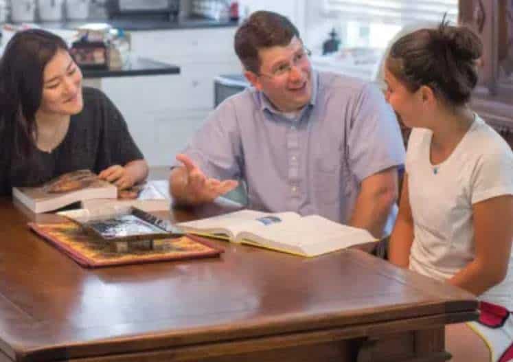 Blair Academy students in discussion around a table