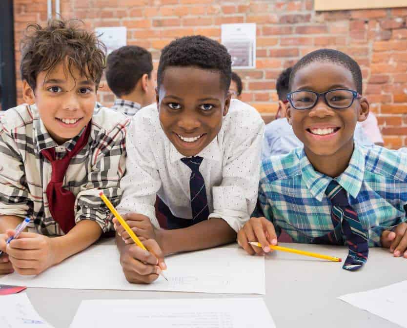 Nativity Preparatory School students working together at a table